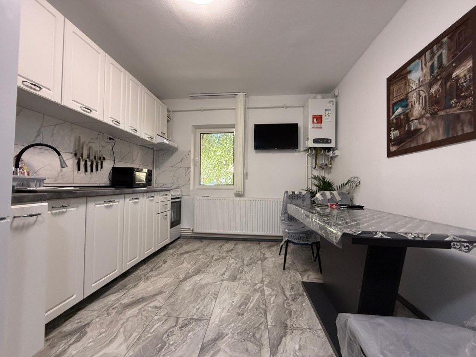 Apartement modern, semidecomandat, 2 camere, 60 mp, parter - Dambovita