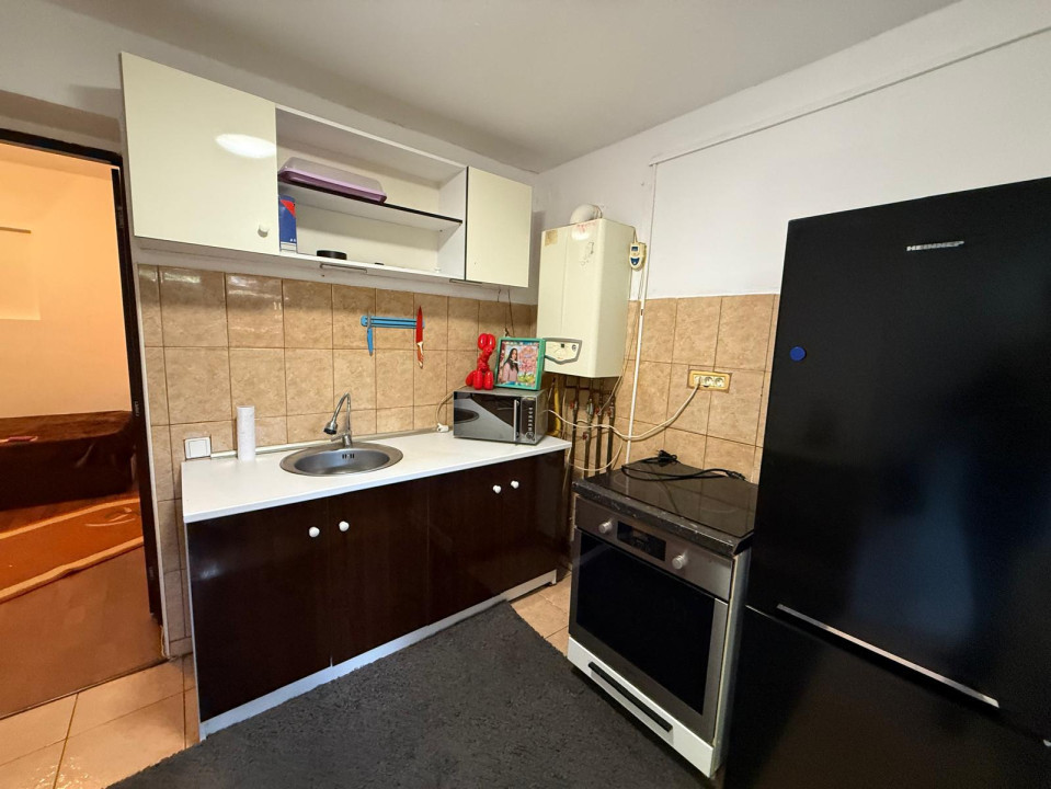 Casa cu o camere si bucatarie mare in curte comuna,  45mp utili, in zona Traian