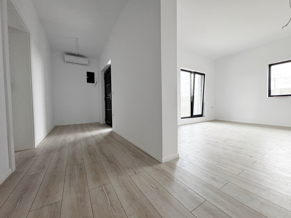 Casa individuala 4 camere,648mp teren,93mp utili, asfalt -Mosnita Noua