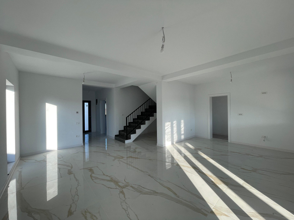 Duplex despartit prin camera tehnica  finisaje premium Mosnita