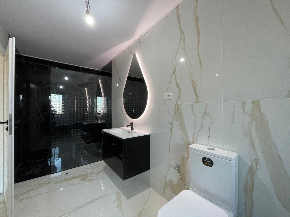 Duplex despartit prin camera tehnica  finisaje premium Mosnita