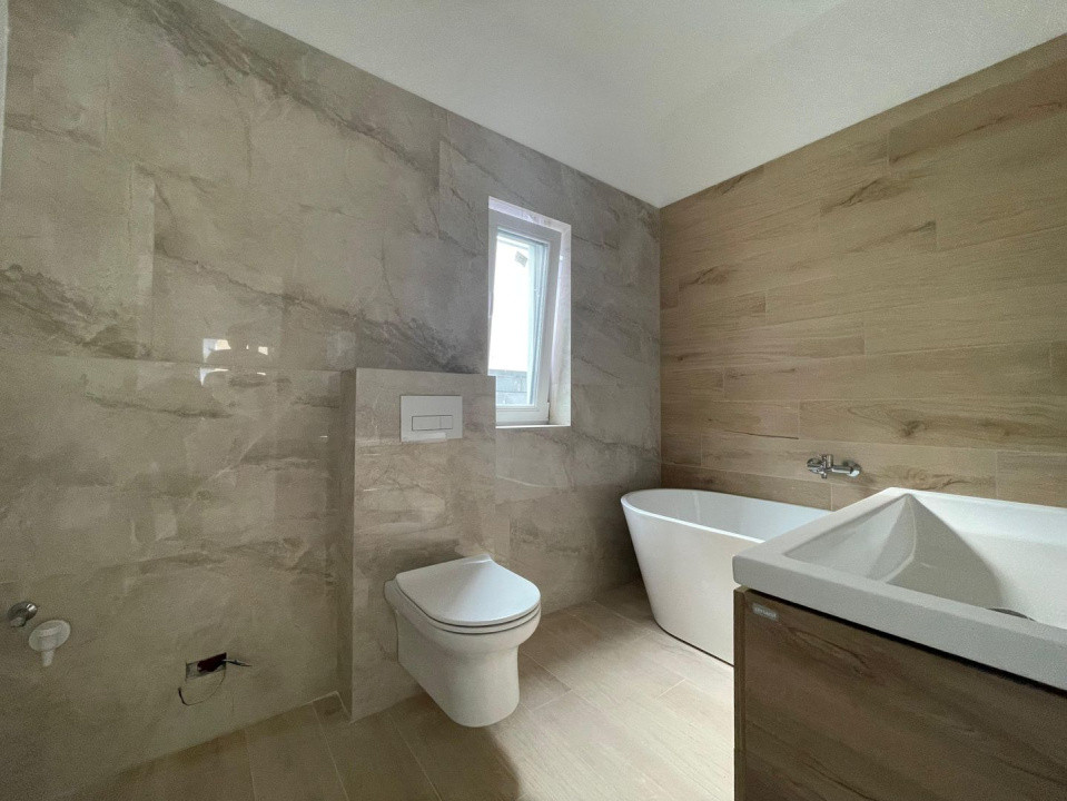 Duplex pe parter 4 camere separat prin dressing Urseni