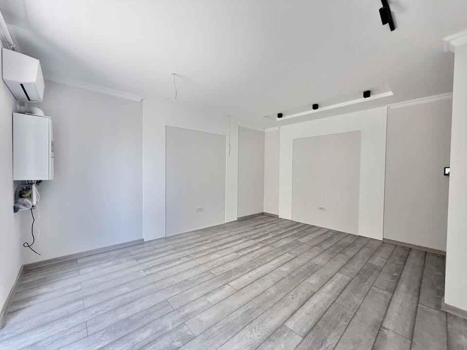 Apartament 2 camere, open space, 48mp utili, 30mp curte in Giroc 