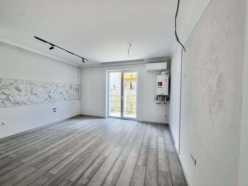 Apartament 2 camere, open space, 48mp utili, 30mp curte in Giroc 