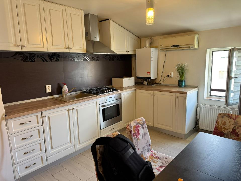 Apartament cu 3 camere, decomandat, 66 mp utili - Dambovita