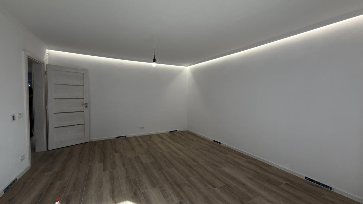 Apartament 3 camere, 2 bai, etaj 1 decomandat, 65 mp utili - Dambovita