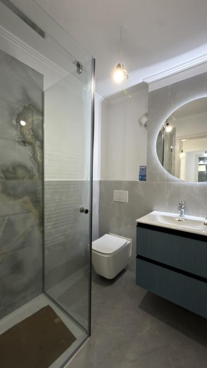 Apartament 3 camere, 2 bai, etaj 1 decomandat, 65 mp utili - Dambovita